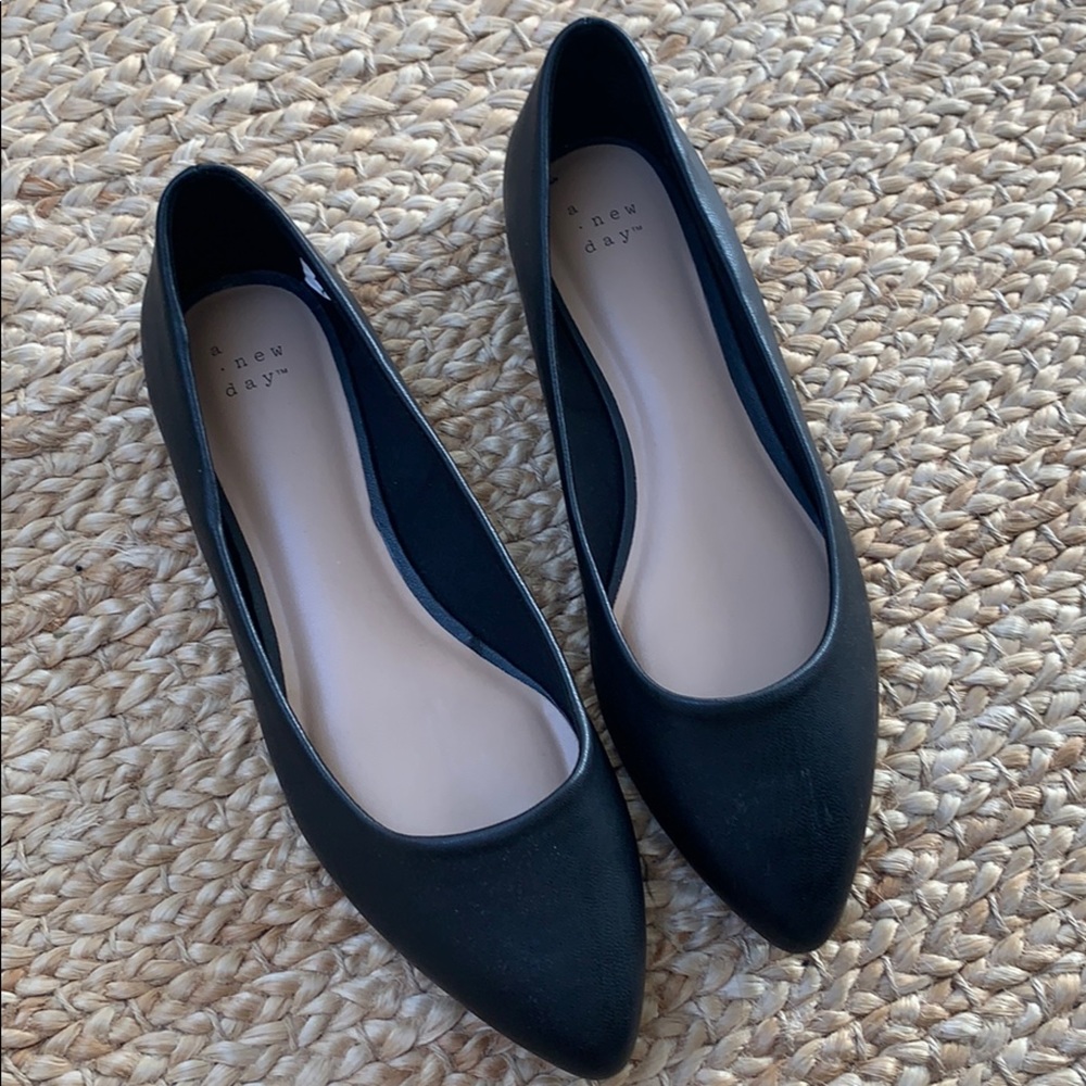 Brand new never worn black point toe flats